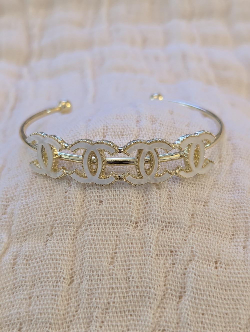 Designer  Gold and White Interlocking Logo Cuff Bracelet
